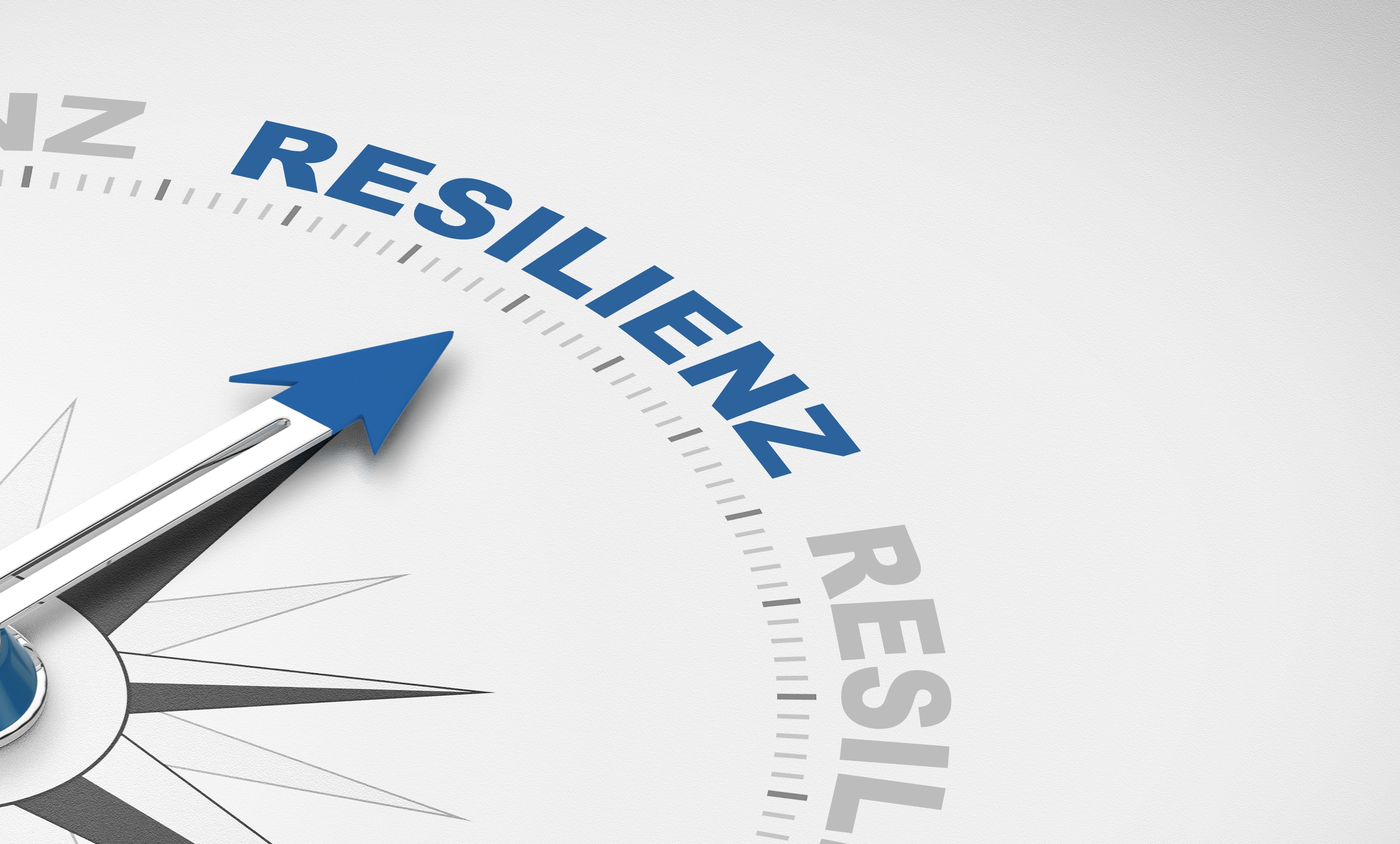 Ein Kompass mit dem Zeiger auf  dem Wort Resilienz 