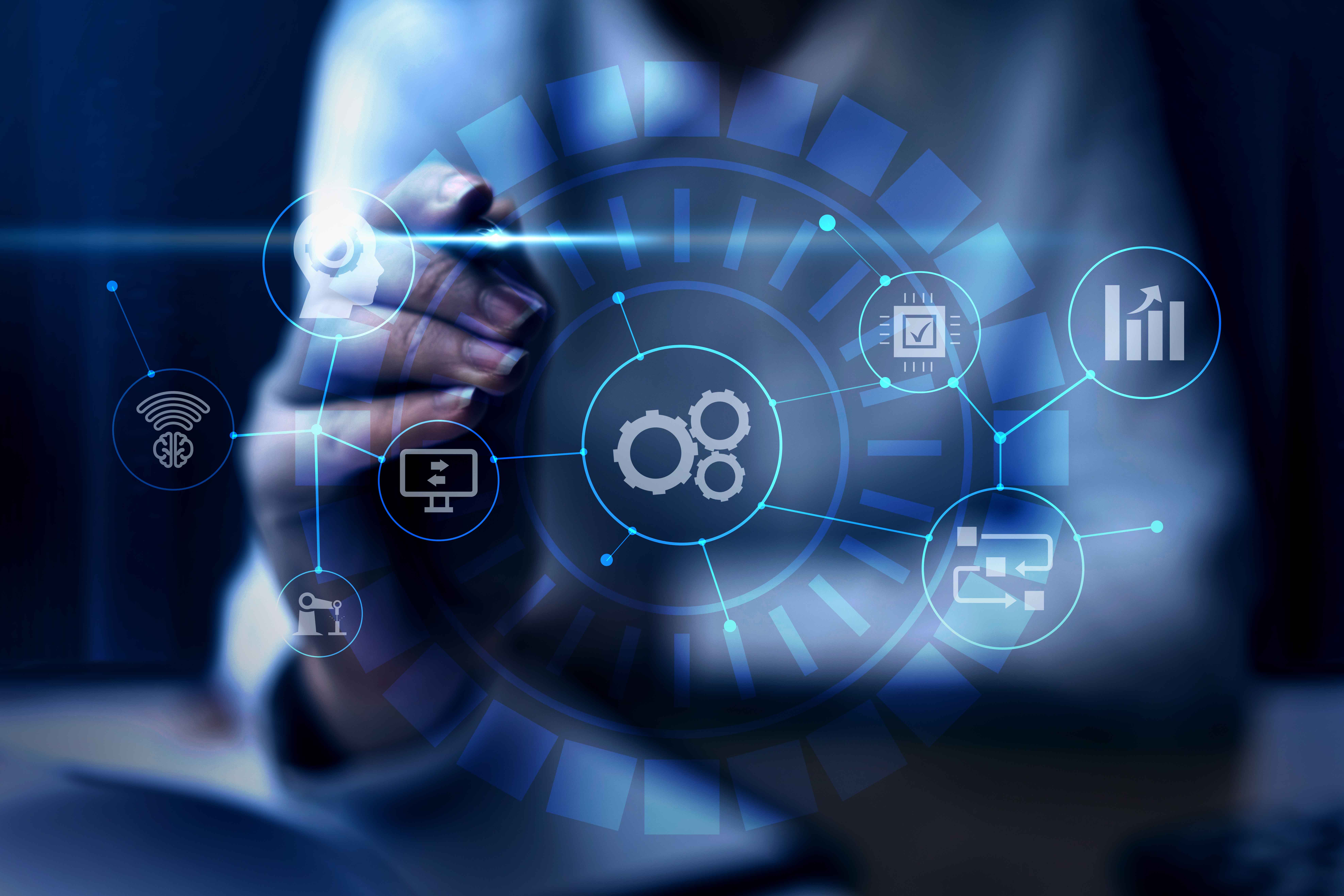 Hand zeigt auf digitale Schnittstelle mit Technologie-Icons.