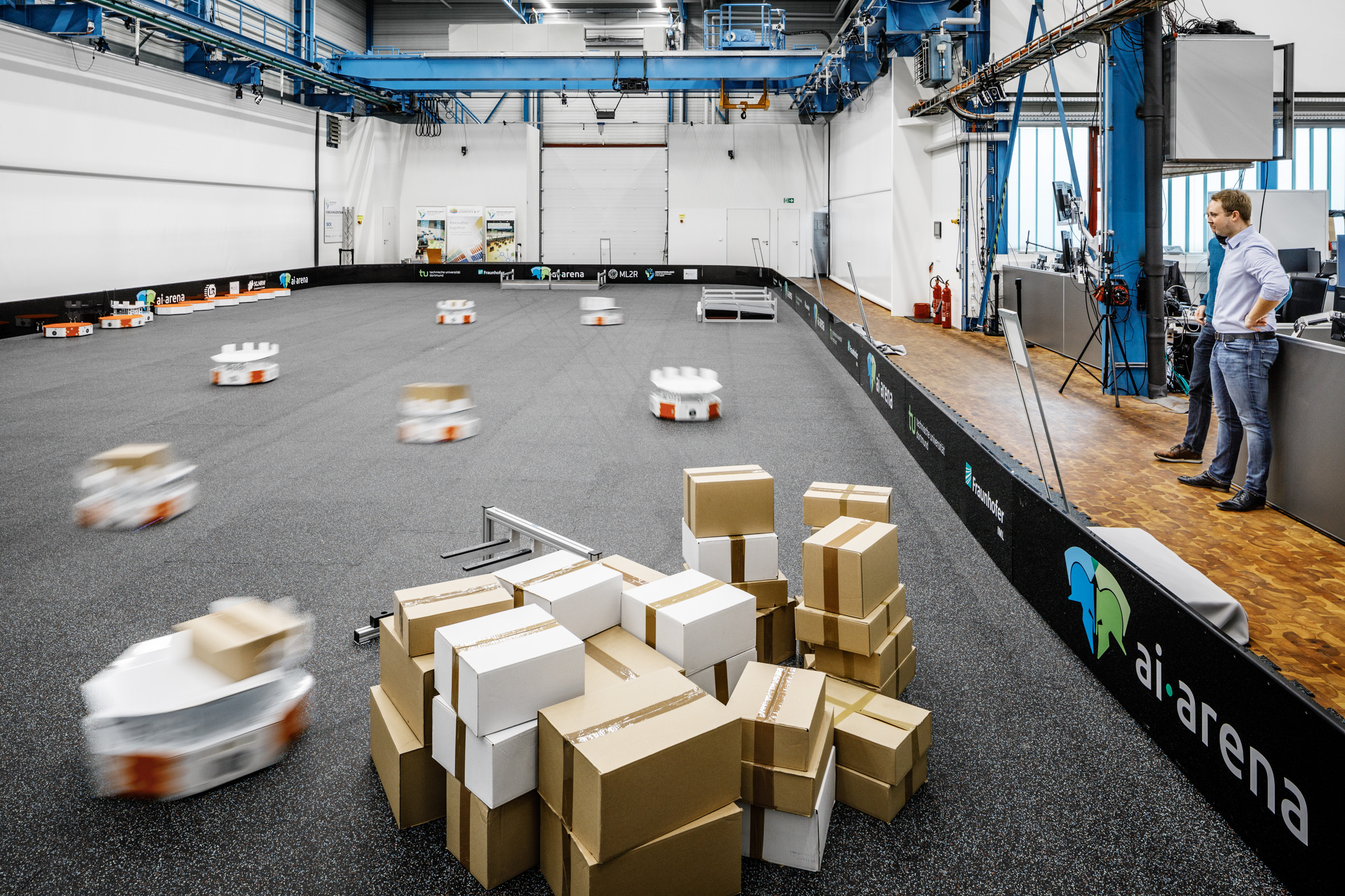 The picture shows robots in motion.