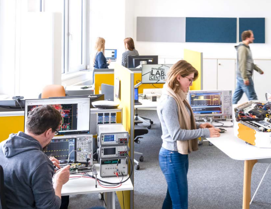 People are working on different projects in the Open Lab