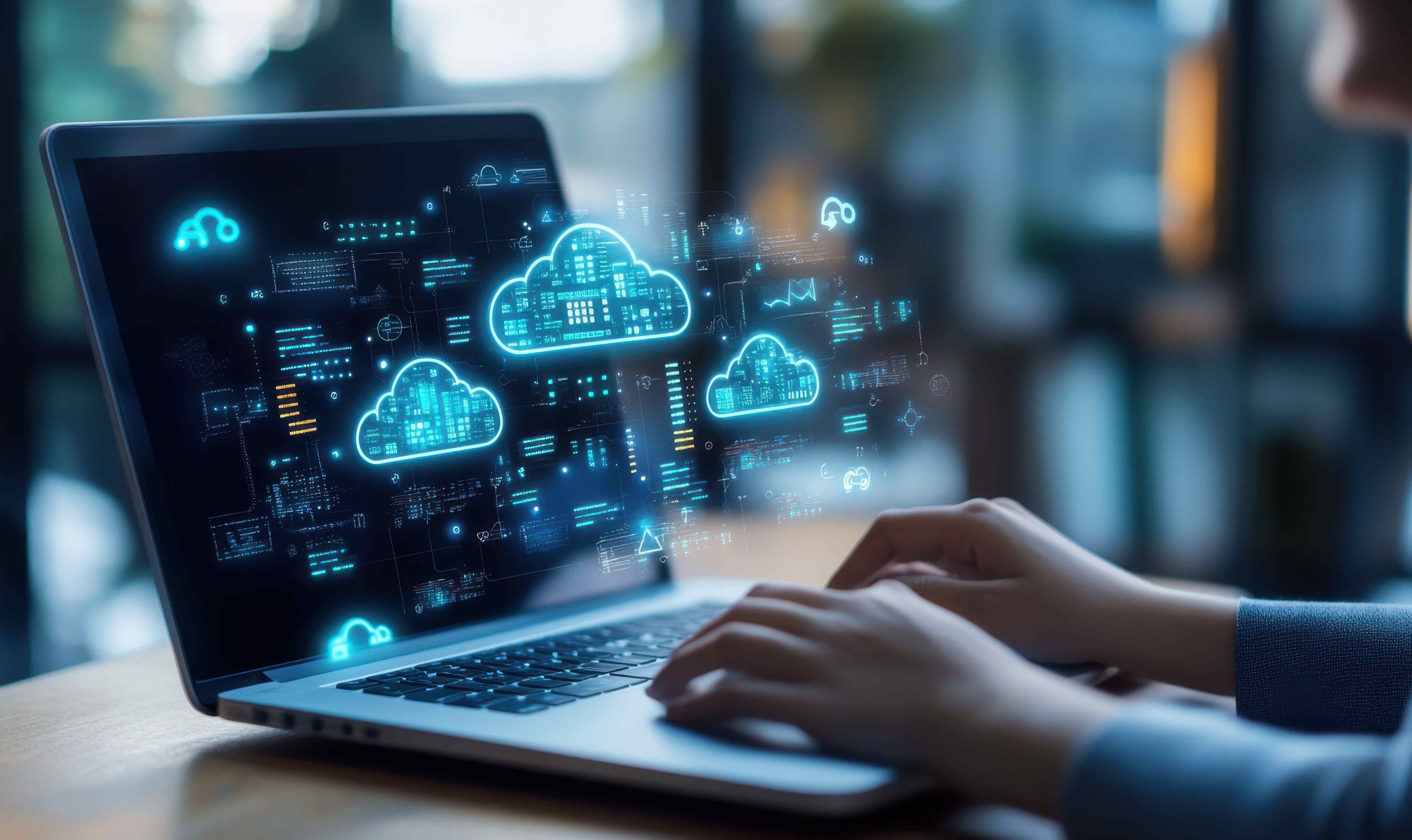 The image shows a person working on a laptop while digital clouds and data visualisations float across the screen.